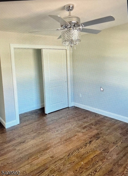 116 Chapel Street Newark, NJ 07105 - Photo 8 of 10 a view of a room with wooden floor