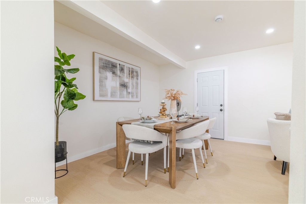 917 South Aprilia Avenue Compton, CA 90220 - Photo 13 of 24 a view of a dining room with furniture