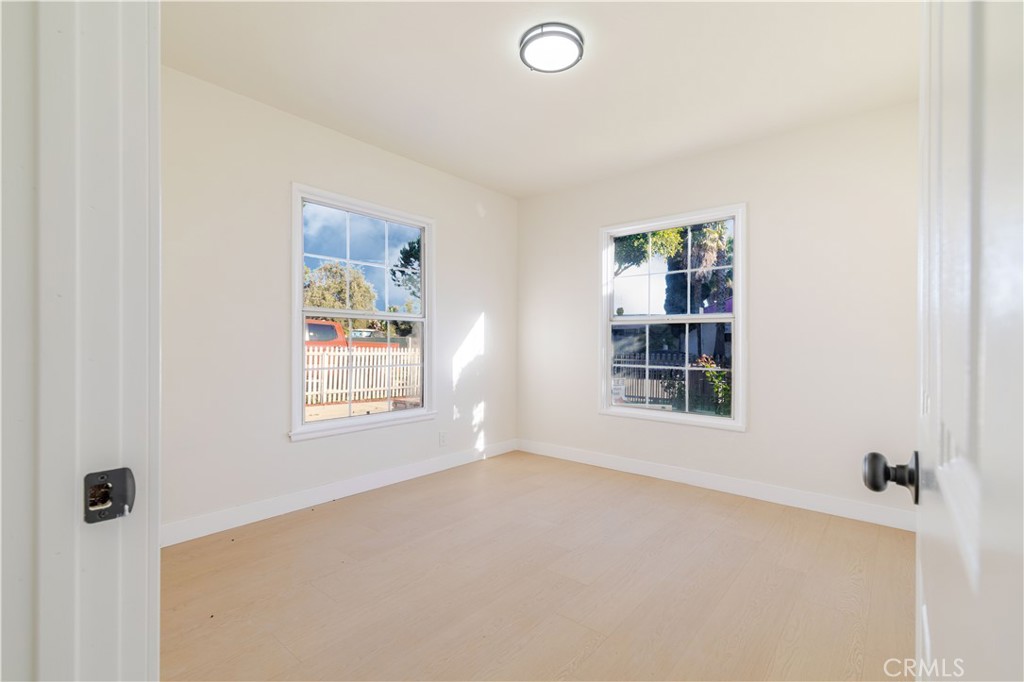 917 South Aprilia Avenue Compton, CA 90220 - Photo 14 of 24 an empty room with windows
