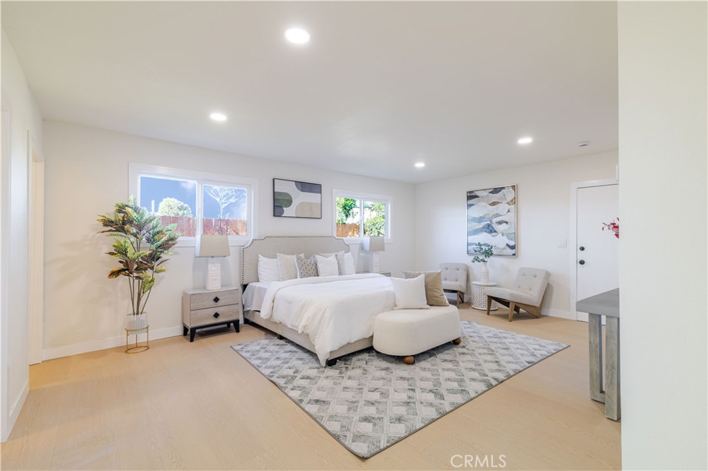 917 South Aprilia Avenue Compton, CA 90220 - Photo 6 of 24 a living room with furniture and a couch