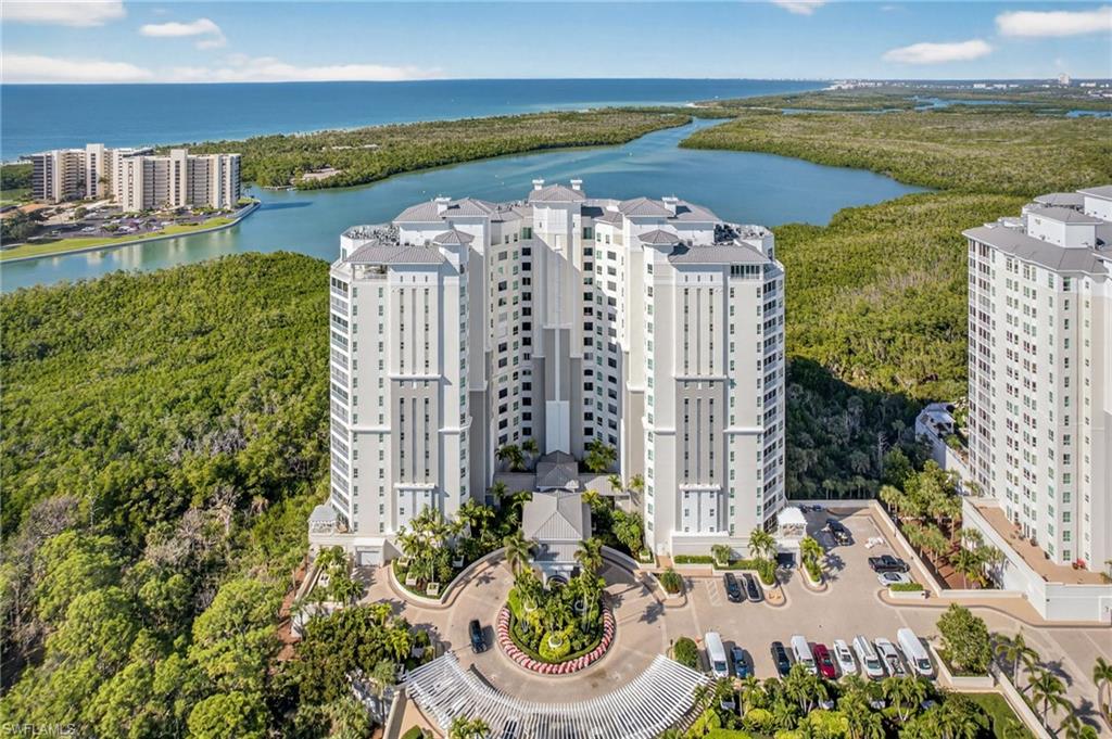 295 Grande Way, Unit 901 Naples, FL 34110 - Photo 33 of 50 a view of a city with an ocean view