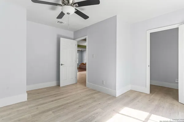 a view of an empty room and window