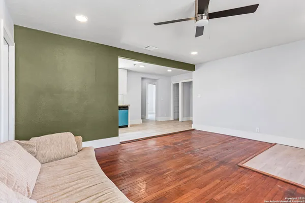 a view of livingroom and hardwood floor