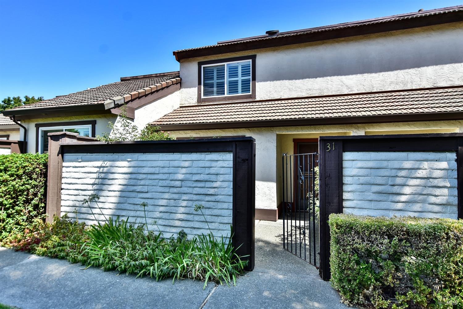 31 Vineyard Circle Sonoma, CA 95476 - Photo 1 of 1 a view of a house with potted plants