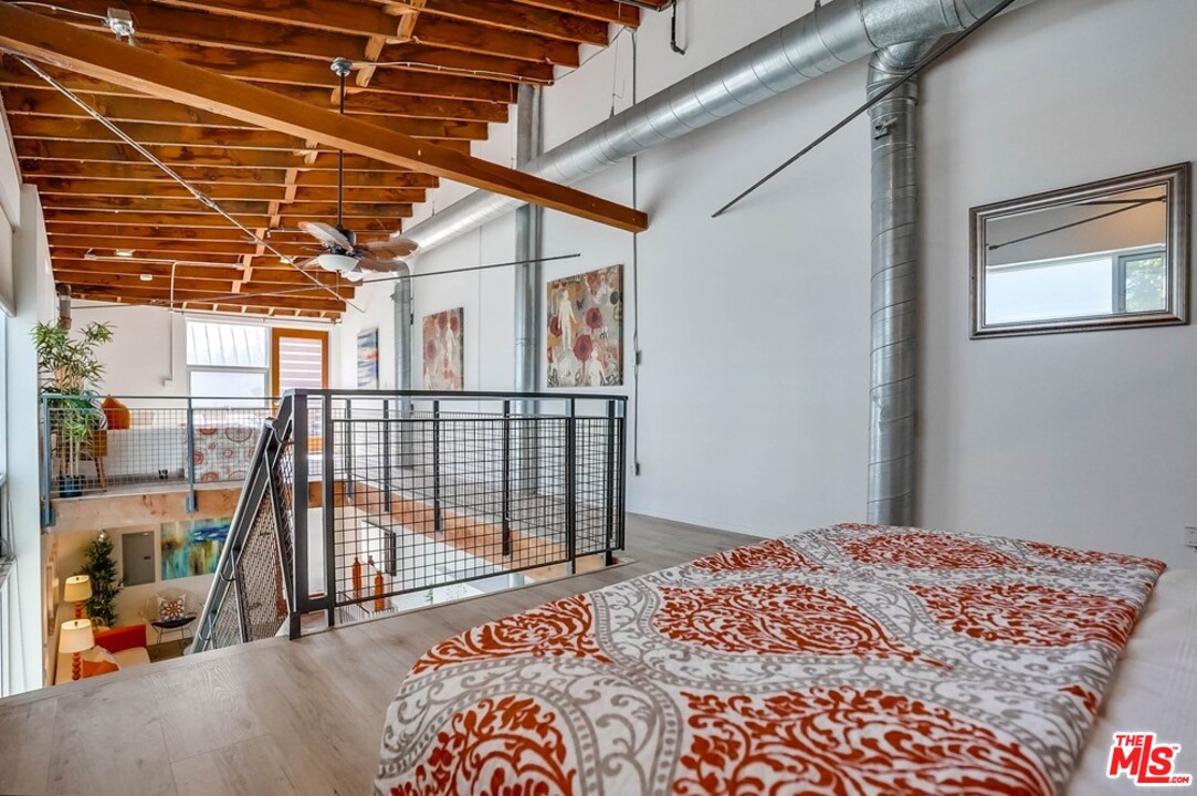 849 Pine Avenue Long Beach, CA 90813 - Photo 33 of 39 a bedroom with a bed and a window