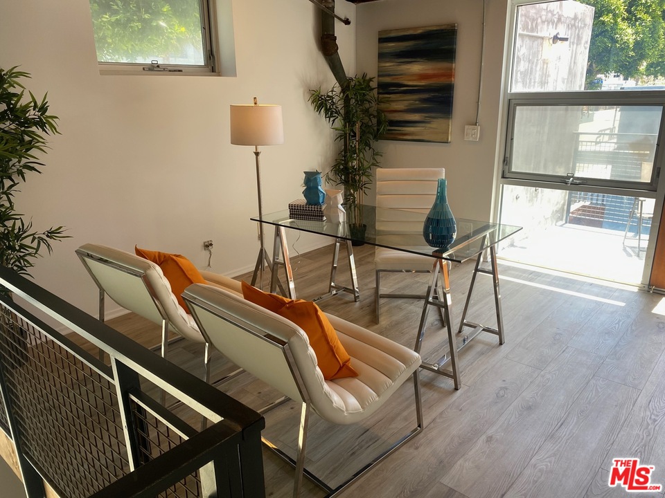 849 Pine Avenue Long Beach, CA 90813 - Photo 8 of 39 a bedroom with a bed and a window