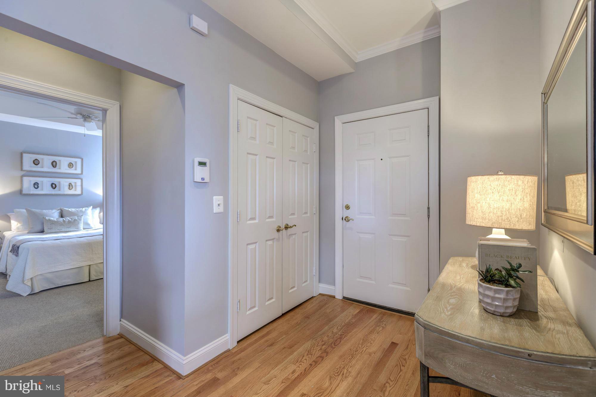 1306 O Street Northwest, Unit 201 Washington, DC 20005 - Photo 2 of 14 Entry Foyer with Coat Closet