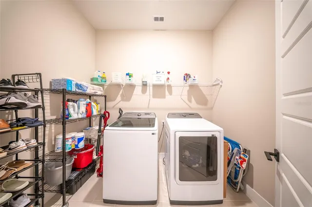 a view of a room with air conditioner duct and windows