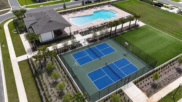 a workspace with furniture and wooden floor