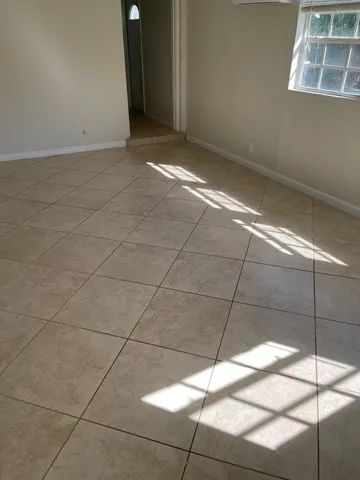 a white refrigerator freezer sitting in a kitchen