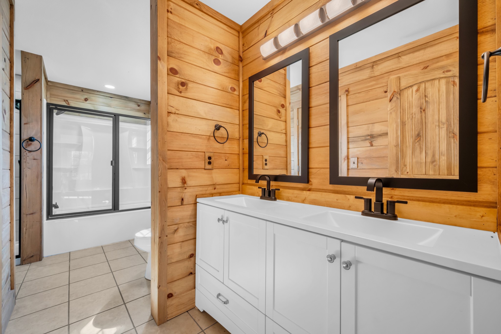 718 Darrell Rye Road Erin, TN 37061 - Photo 21 of 38 a bathroom with a sink and a mirror