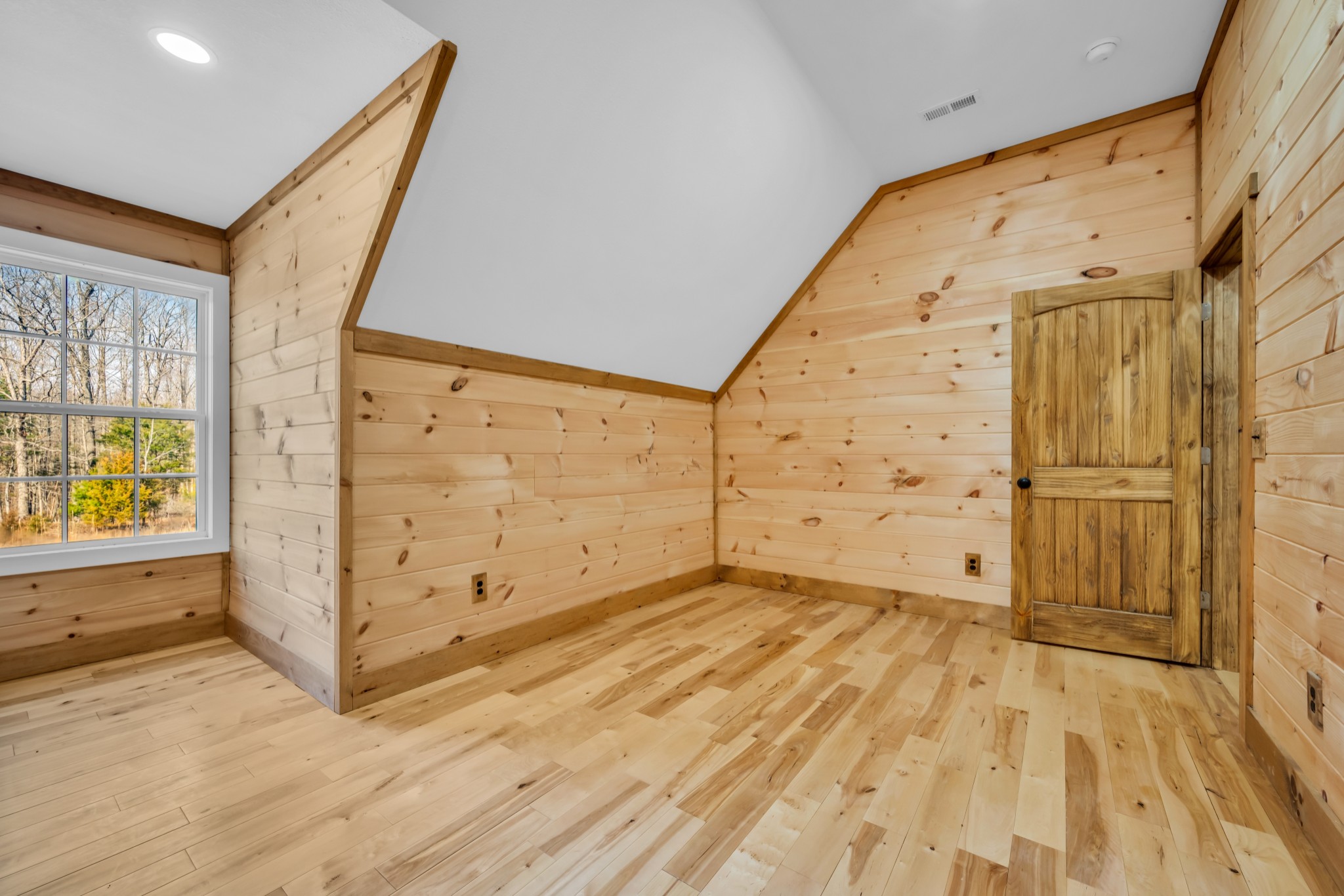 718 Darrell Rye Road Erin, TN 37061 - Photo 32 of 38 a view of a hallway with wooden floor and cabinet