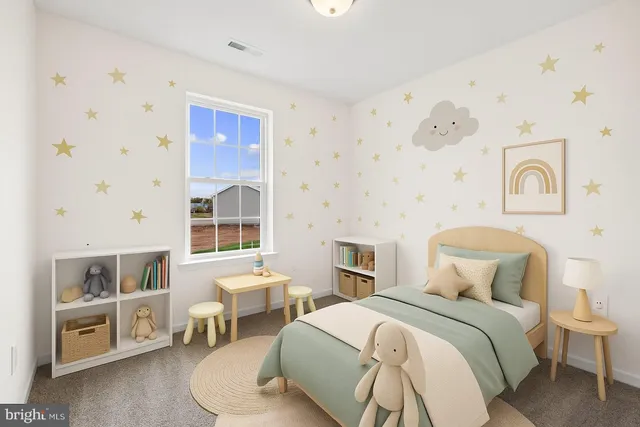 a bedroom with a bed and a chair with the outer view