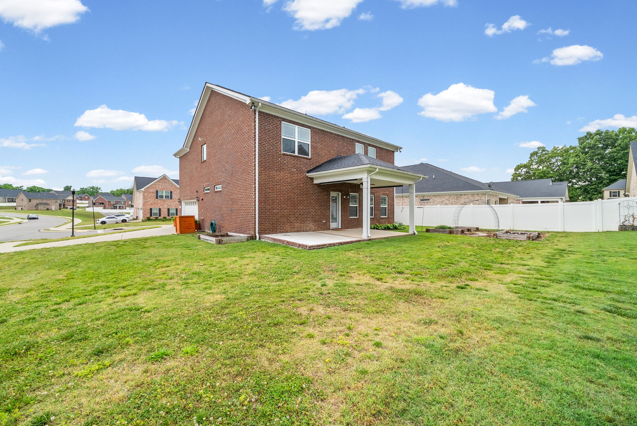 719 Reflections Lane Pleasant View, TN 37146 - Photo 35 of 46 a backyard of a house with lots of green space