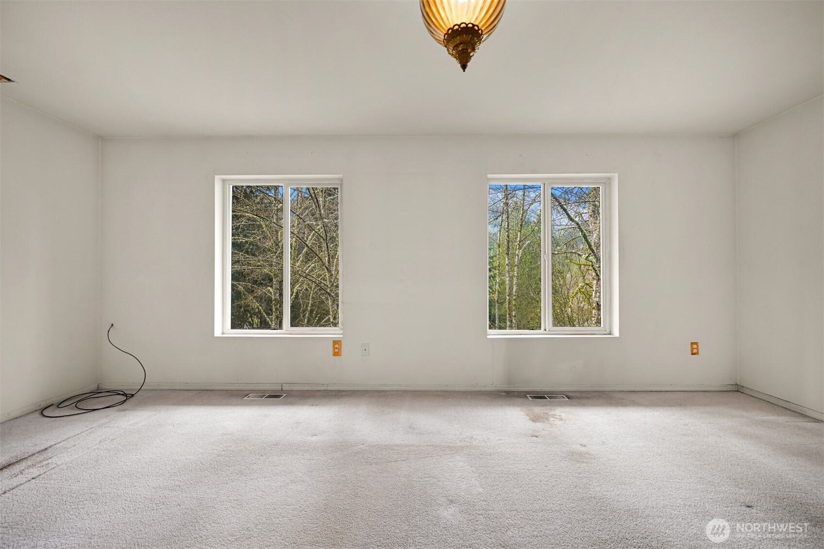 372 Sudden Valley Drive Bellingham, WA 98229 - Photo 11 of 20 an empty room with windows