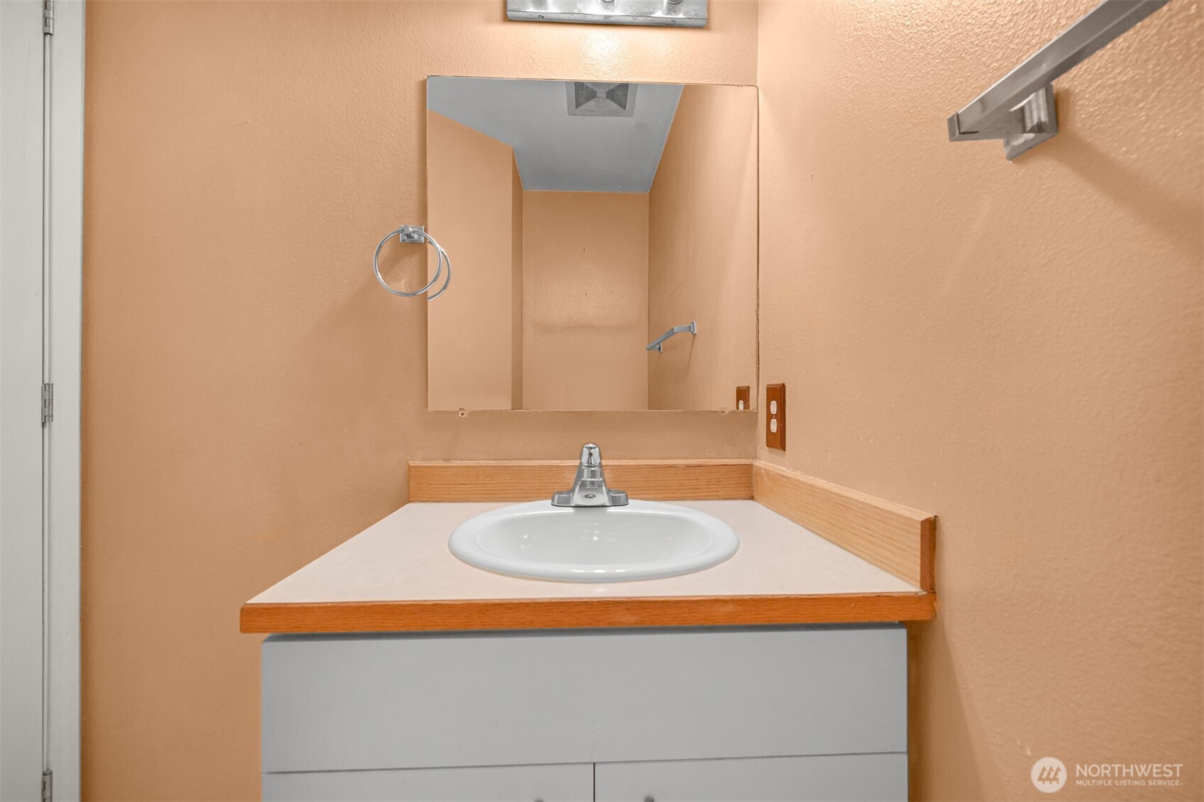 372 Sudden Valley Drive Bellingham, WA 98229 - Photo 12 of 20 a bathroom with a sink and a mirror