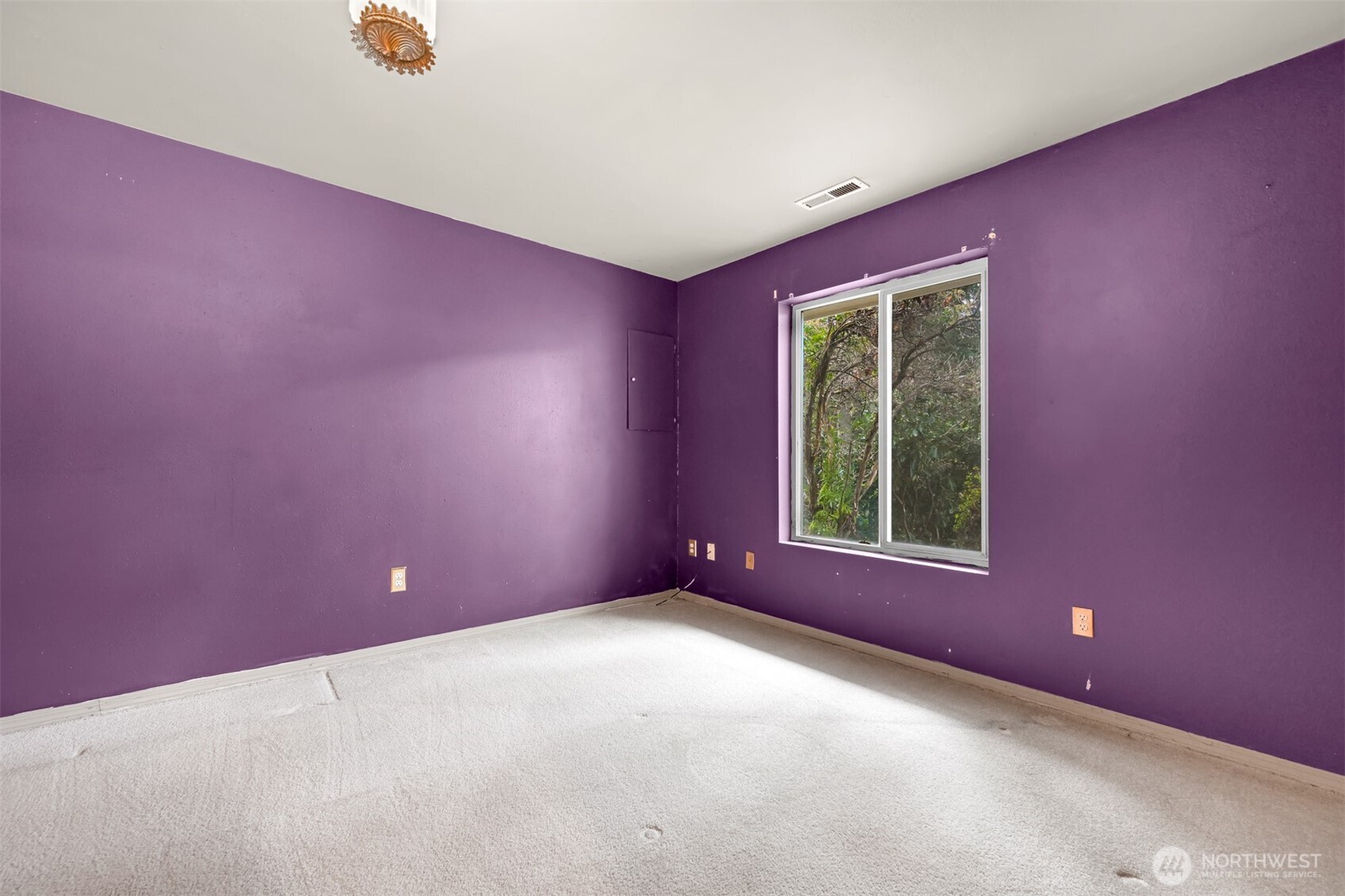 372 Sudden Valley Drive Bellingham, WA 98229 - Photo 15 of 20 a view of a livingroom with an empty room and window