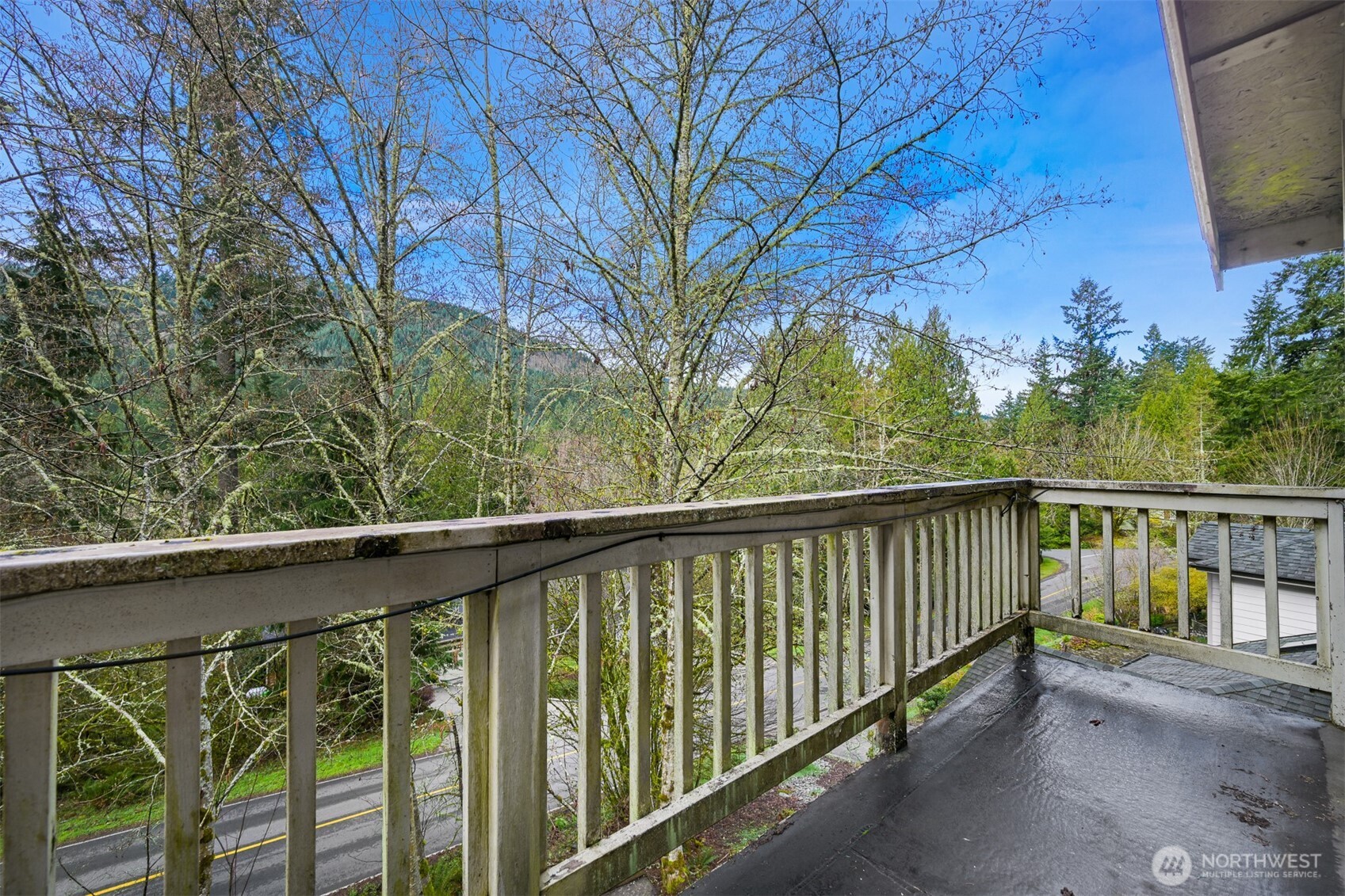 372 Sudden Valley Drive Bellingham, WA 98229 - Photo 2 of 20 a balcony with trees in front of it