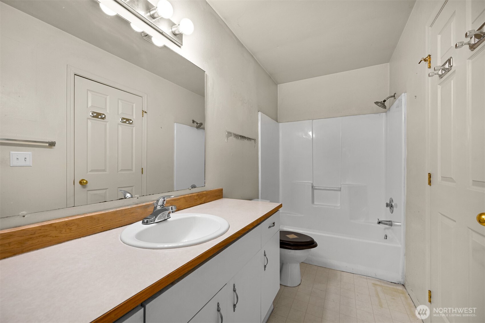 372 Sudden Valley Drive Bellingham, WA 98229 - Photo 3 of 20 a bathroom with a sink and a mirror