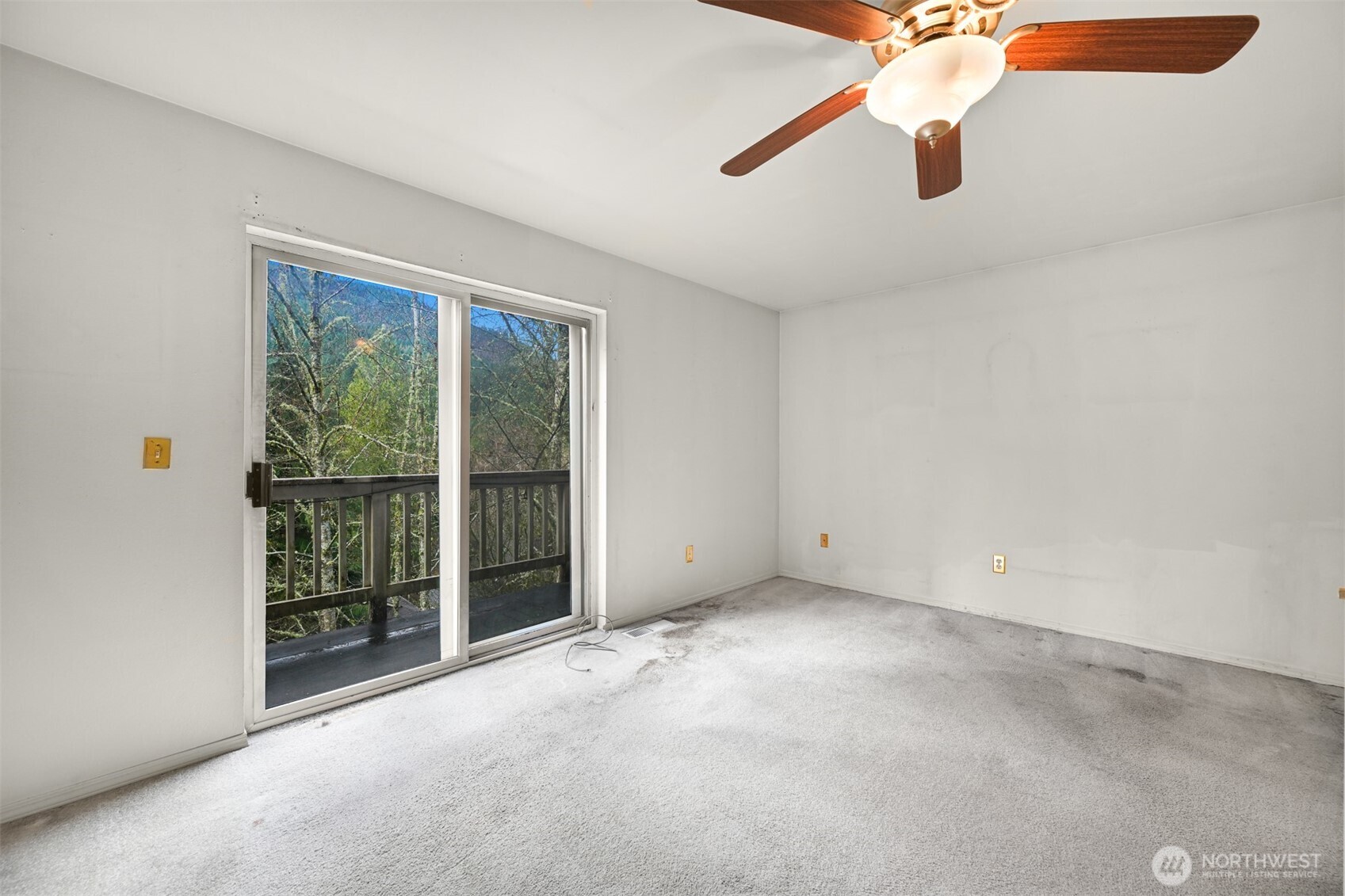 372 Sudden Valley Drive Bellingham, WA 98229 - Photo 5 of 20 a view of an empty room with a window