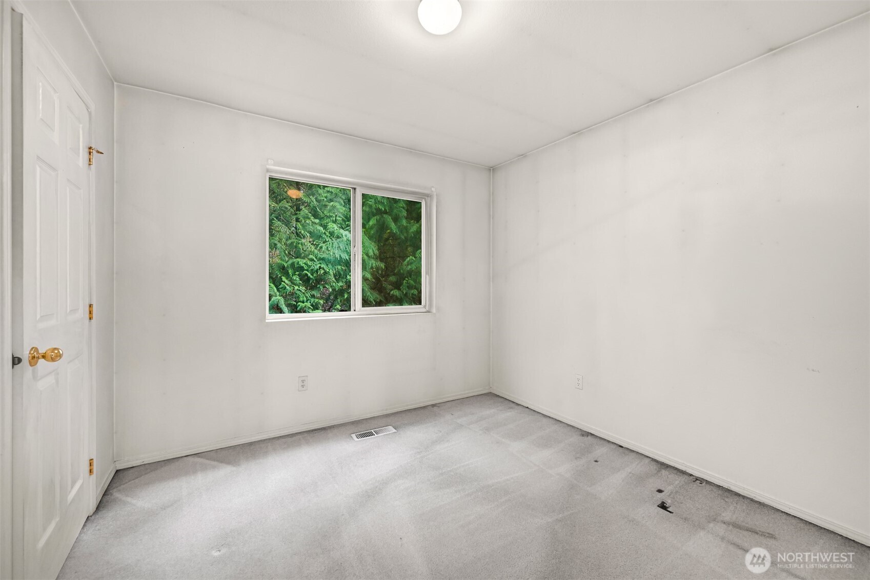 372 Sudden Valley Drive Bellingham, WA 98229 - Photo 6 of 20 an empty room with a window