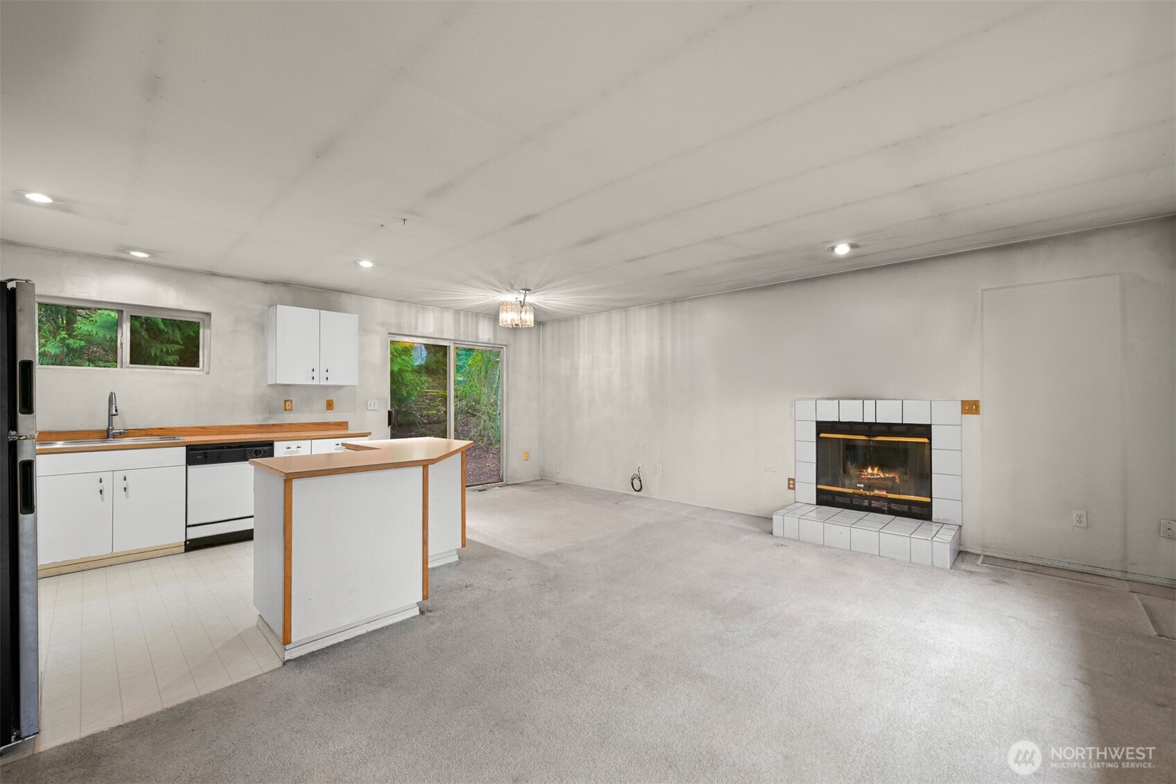 372 Sudden Valley Drive Bellingham, WA 98229 - Photo 10 of 20 a view of kitchen with kitchen island and windows