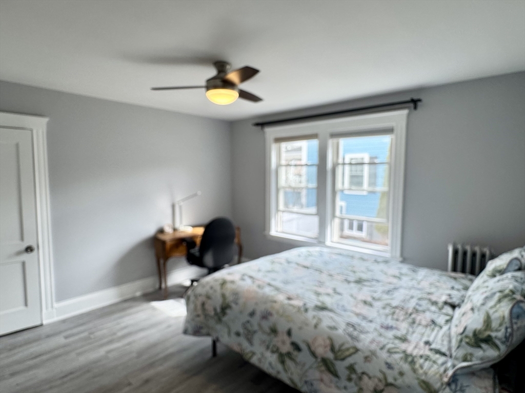 23 Drew Road, Unit 23 Belmont, MA 02478 - Photo 11 of 24 a bedroom with a bed and a window