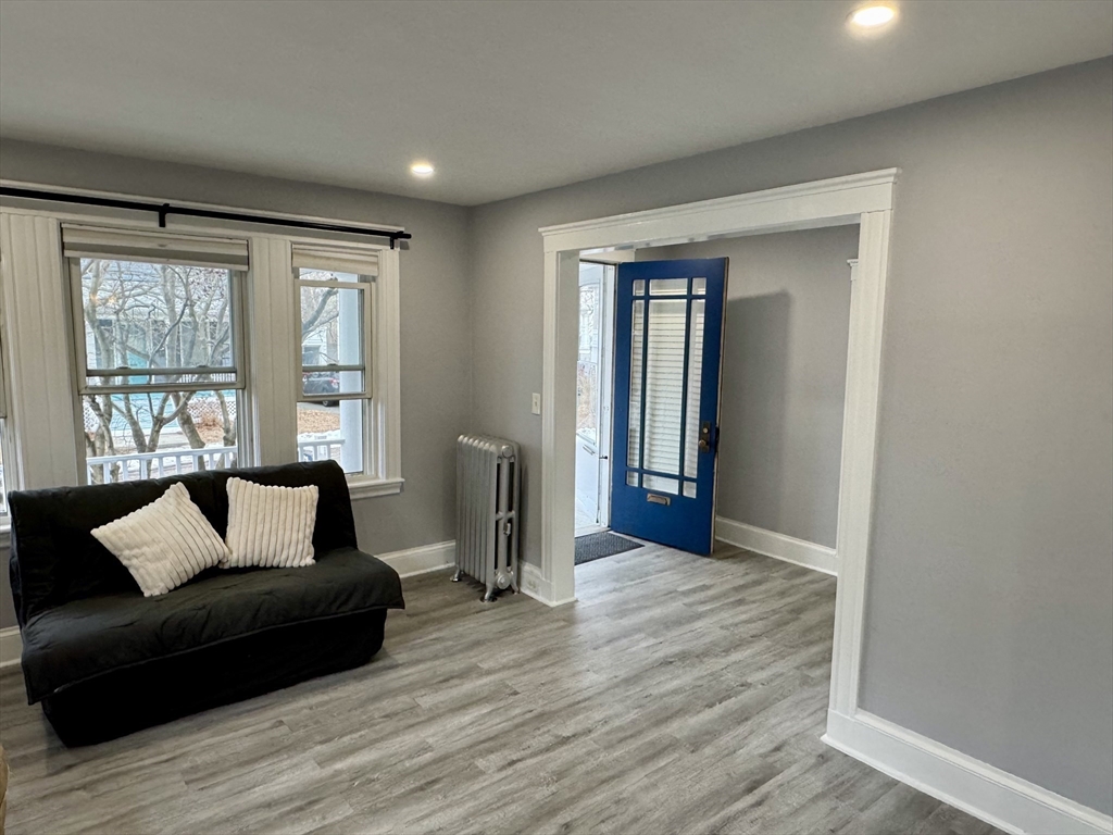 23 Drew Road, Unit 23 Belmont, MA 02478 - Photo 4 of 24 a living room with furniture and a window