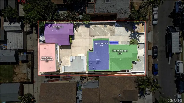 a view of a house with large windows