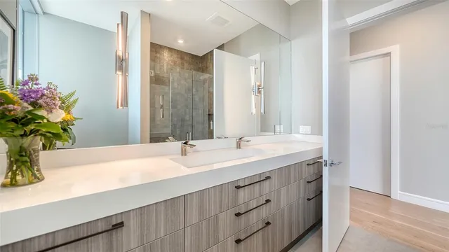 a bathroom with a sink and a mirror