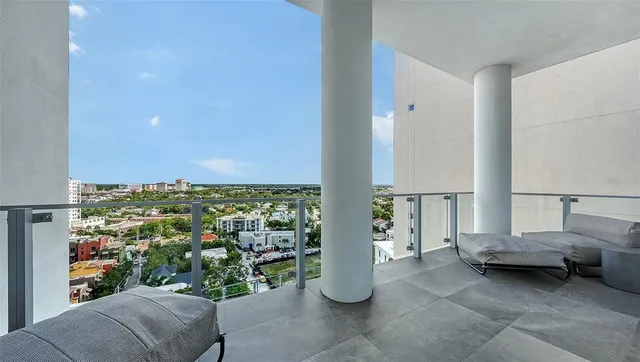 a view of a room with toys and other furniture