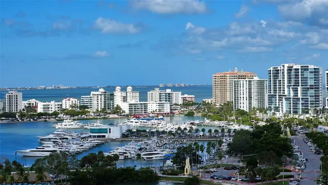 a view of a city with tall buildings