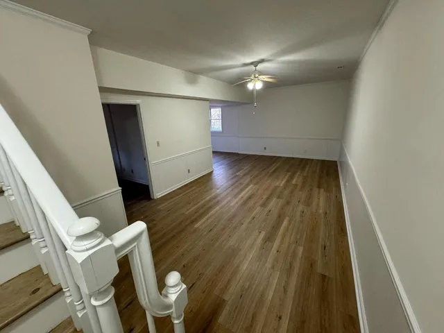 a view of entryway with wooden floor