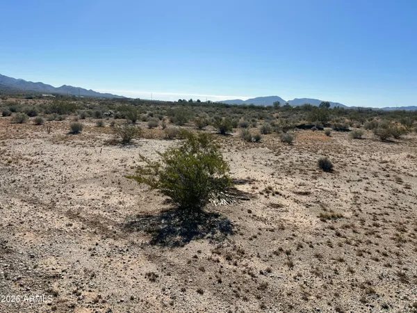a view of mountains and valleys