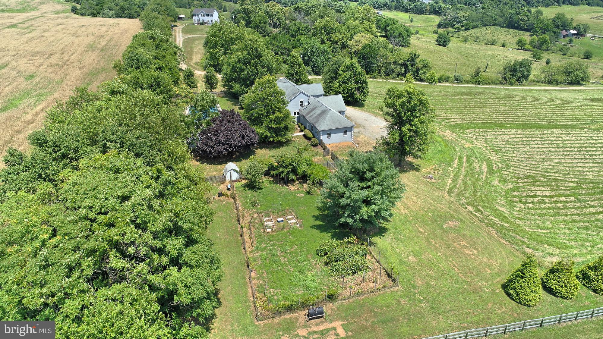 18001 Tranquility Road Purcellville, VA 20132 - Photo 26 of 31 FENCED VEGETABLE GARDEN