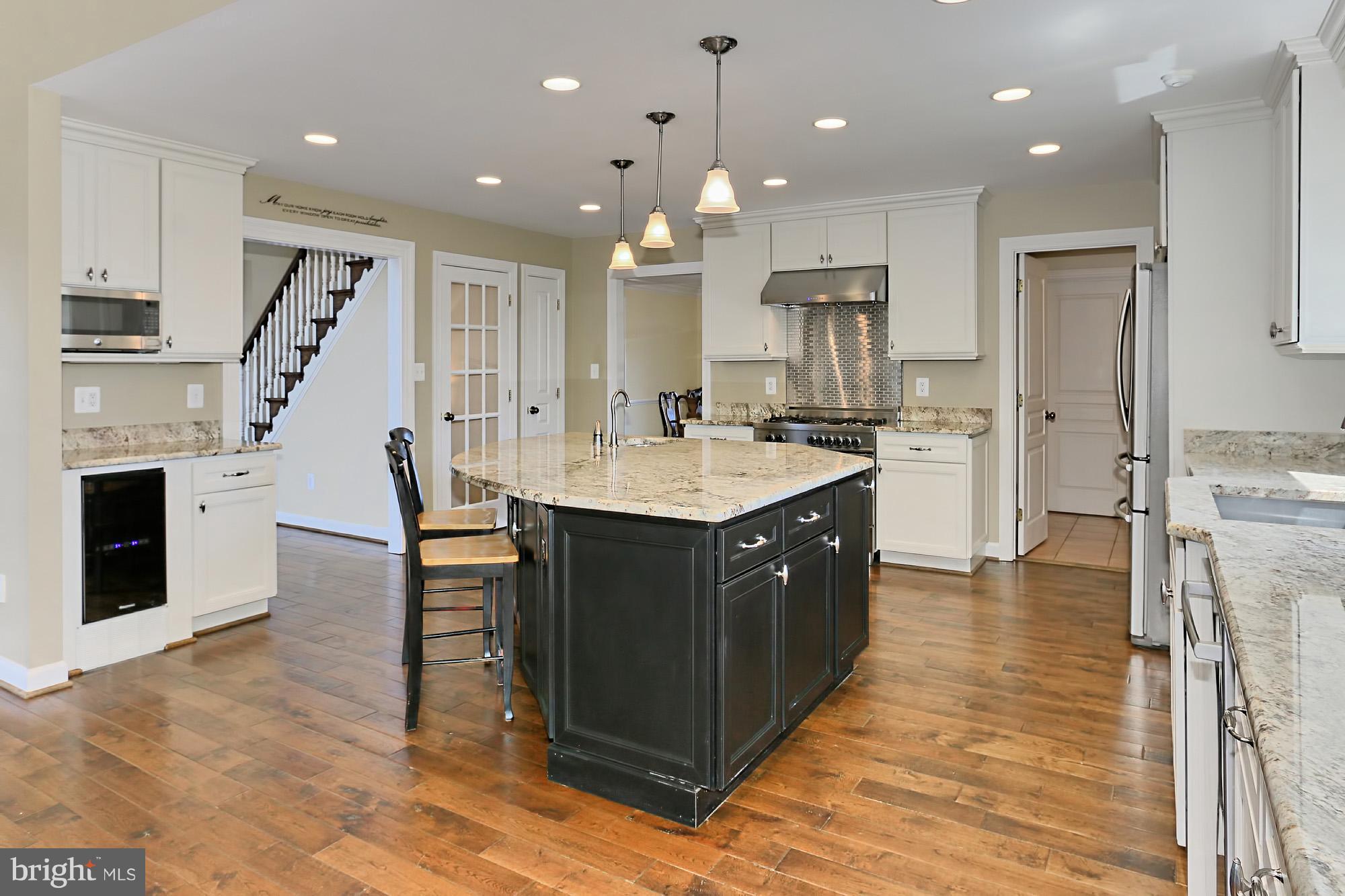 18001 Tranquility Road Purcellville, VA 20132 - Photo 10 of 31 WINE COOLER, RECESSED LIGHTS & GRANITE ISLAND