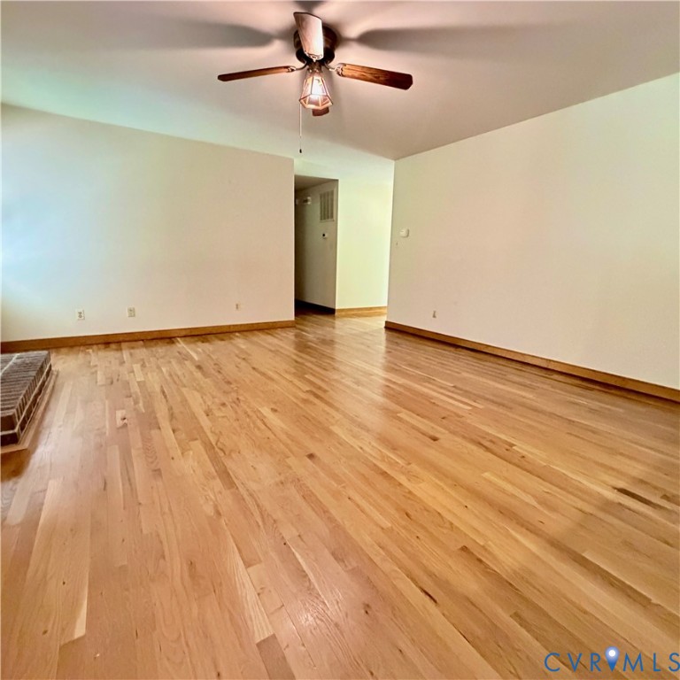 3933 Dunraven Road North Chesterfield, VA 23236 - Photo 21 of 30 an empty room with wooden floor and windows