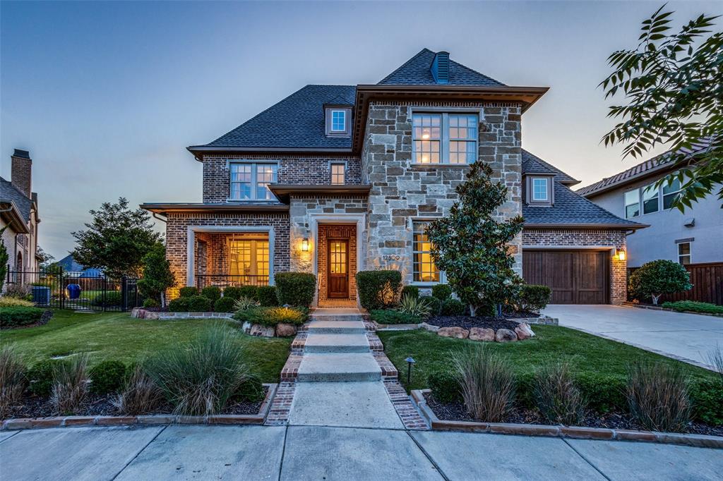 12809 Cross Point Drive Frisco, TX 75033 - Photo 1 of 1 a front view of a house with a yard