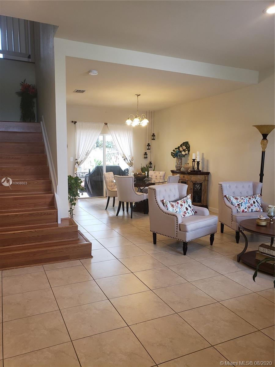 2580 Southwest 147 Path Miami, FL 33185 - Photo 1 of 11 a lobby with furniture and wooden floor