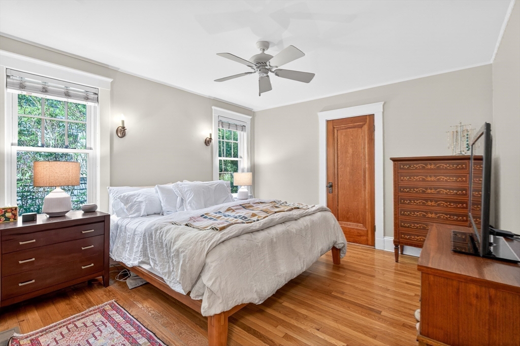 76-78 Lewis Road Belmont, MA 02478 - Photo 10 of 36 a bedroom with a bed and wooden floor