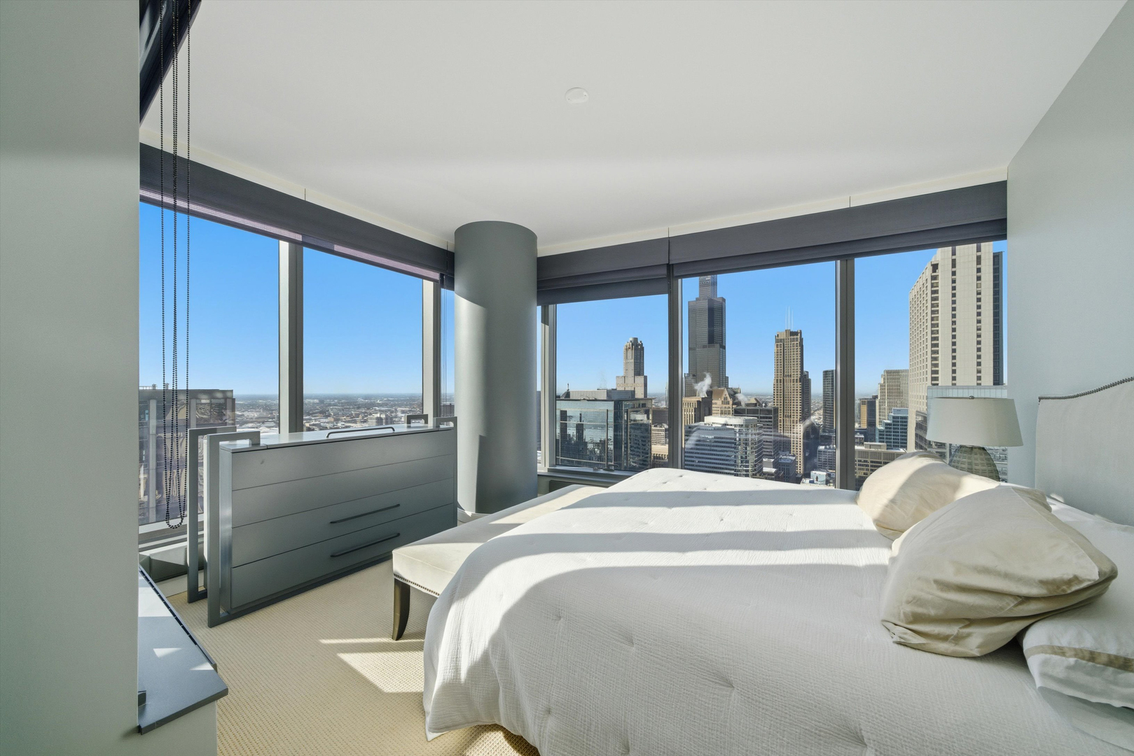 60 East Monroe Street, Unit 5304 Chicago, IL 60603 - Photo 17 of 55 a bedroom with a bed and large window