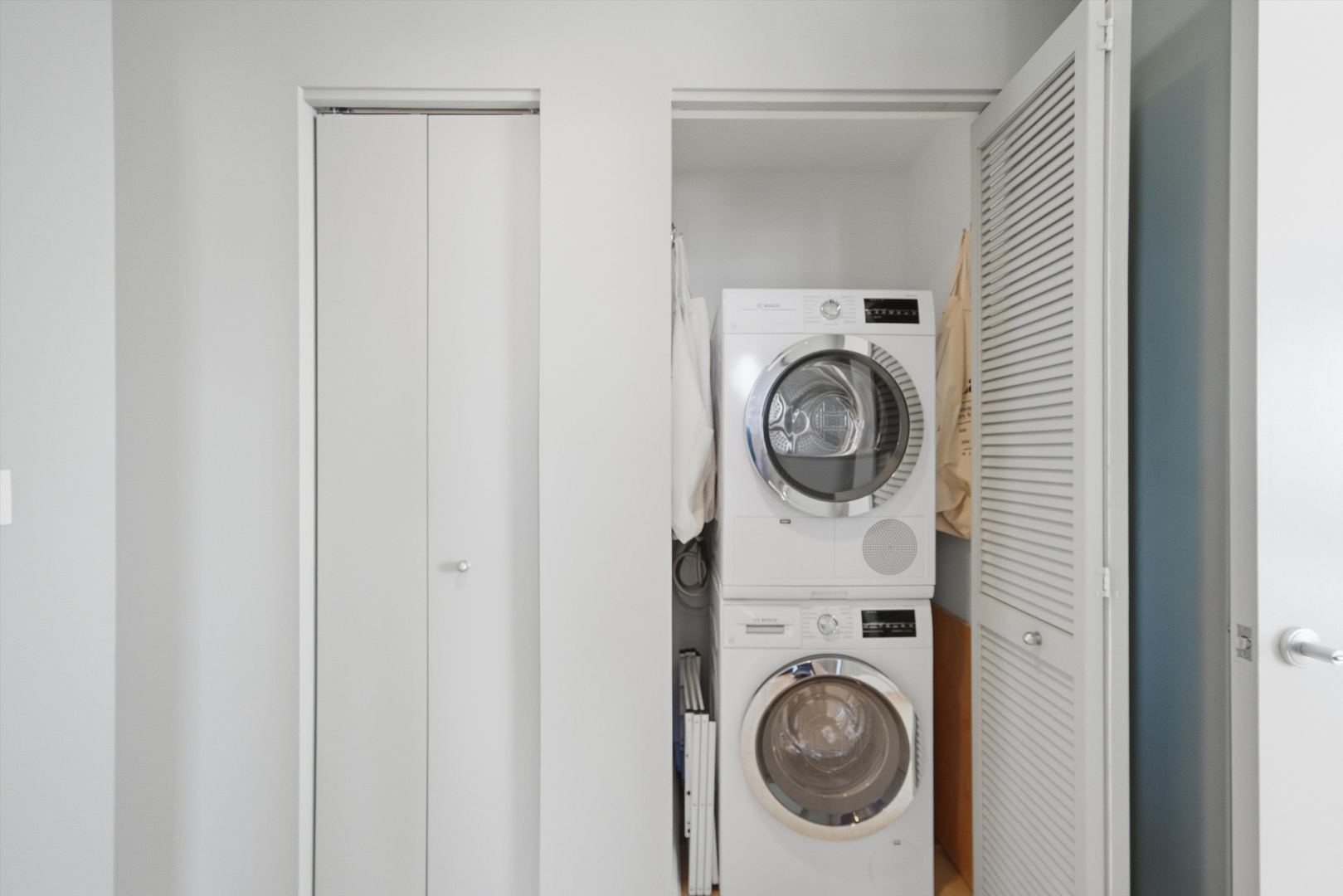 60 East Monroe Street, Unit 5304 Chicago, IL 60603 - Photo 33 of 55 a view of washer and dryer in a utility room