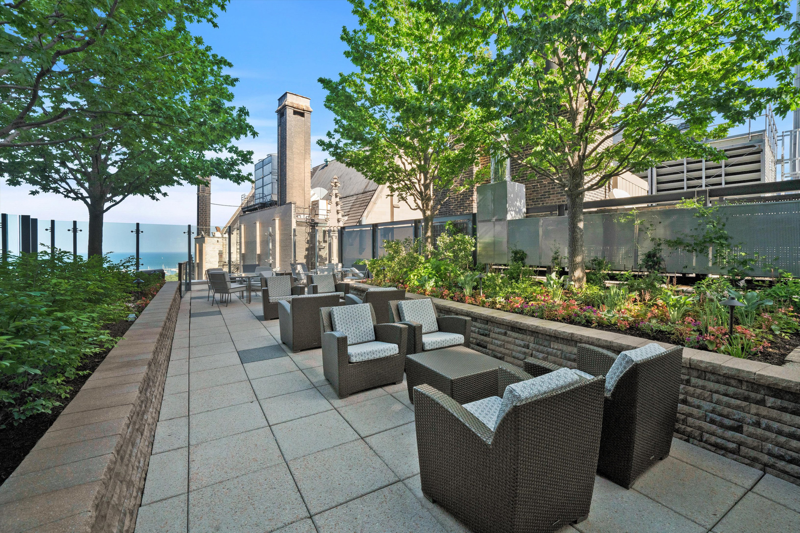 60 East Monroe Street, Unit 5304 Chicago, IL 60603 - Photo 34 of 55 a view of a patio with couches and a fire pit