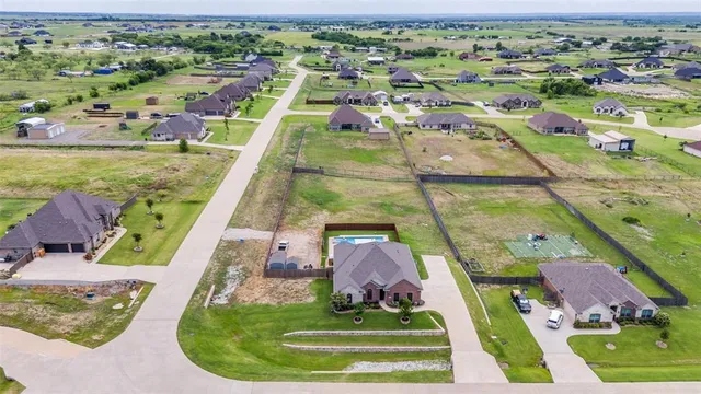 a view of a house with a big yard