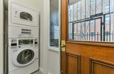 a view of washer and dryer in a utility room