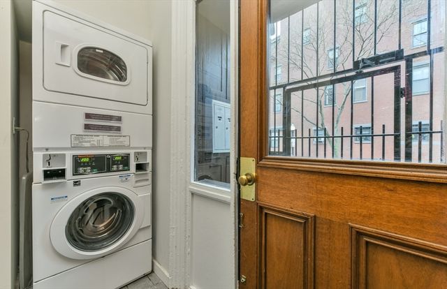 a view of washer and dryer in a utility room