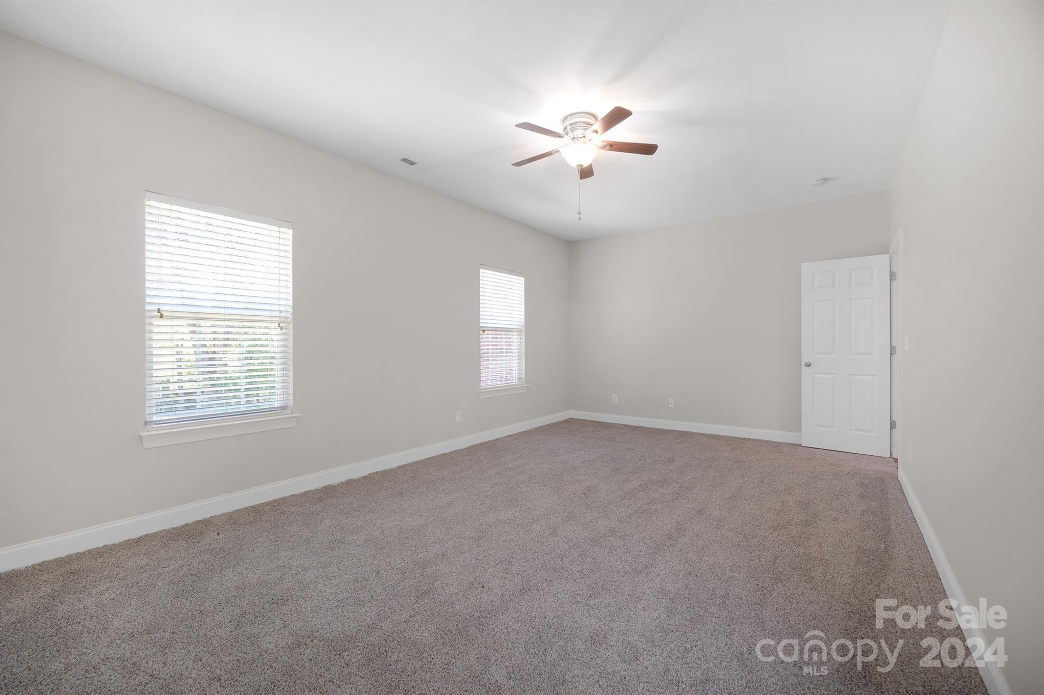 4009 Thorndale Road Indian Trail, NC 28079 - Photo 20 of 48 a view of an empty room with a window