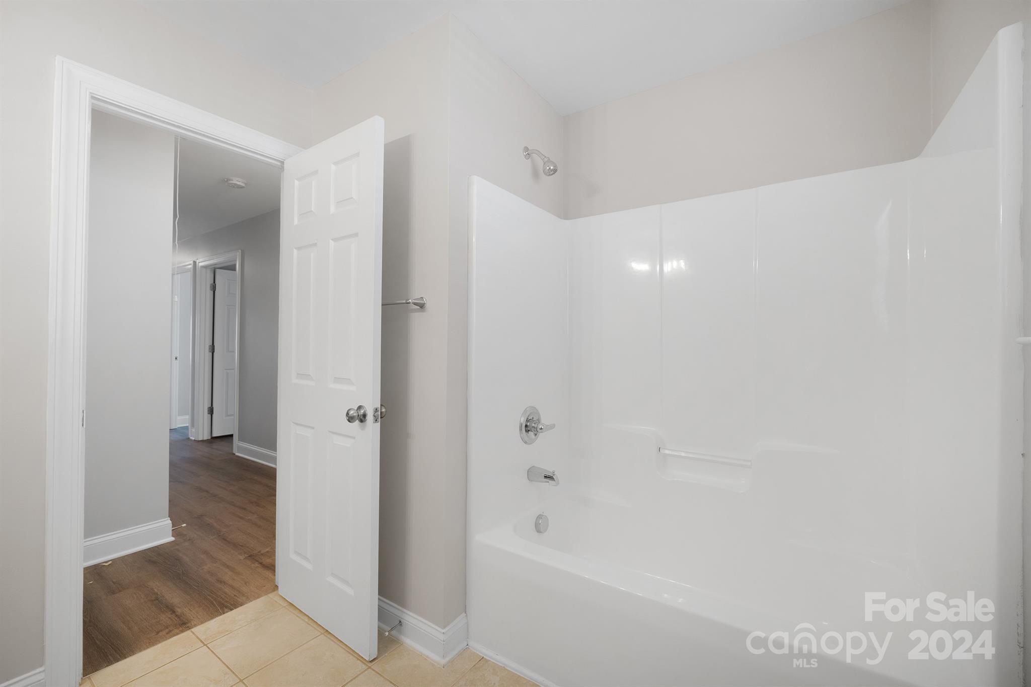 4009 Thorndale Road Indian Trail, NC 28079 - Photo 39 of 48 a bathroom with a bathtub and shower