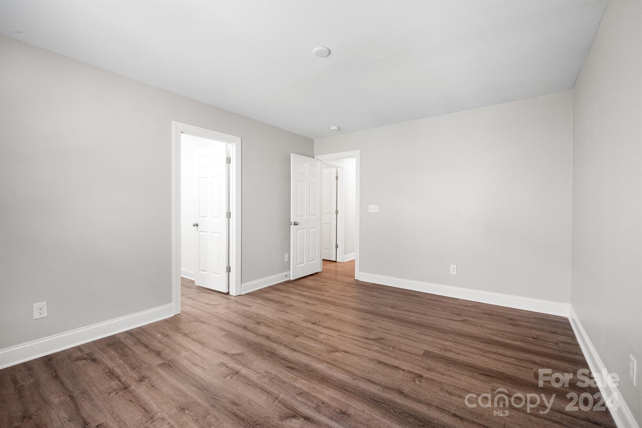 4009 Thorndale Road Indian Trail, NC 28079 - Photo 42 of 48 a view of an empty room with wooden floor
