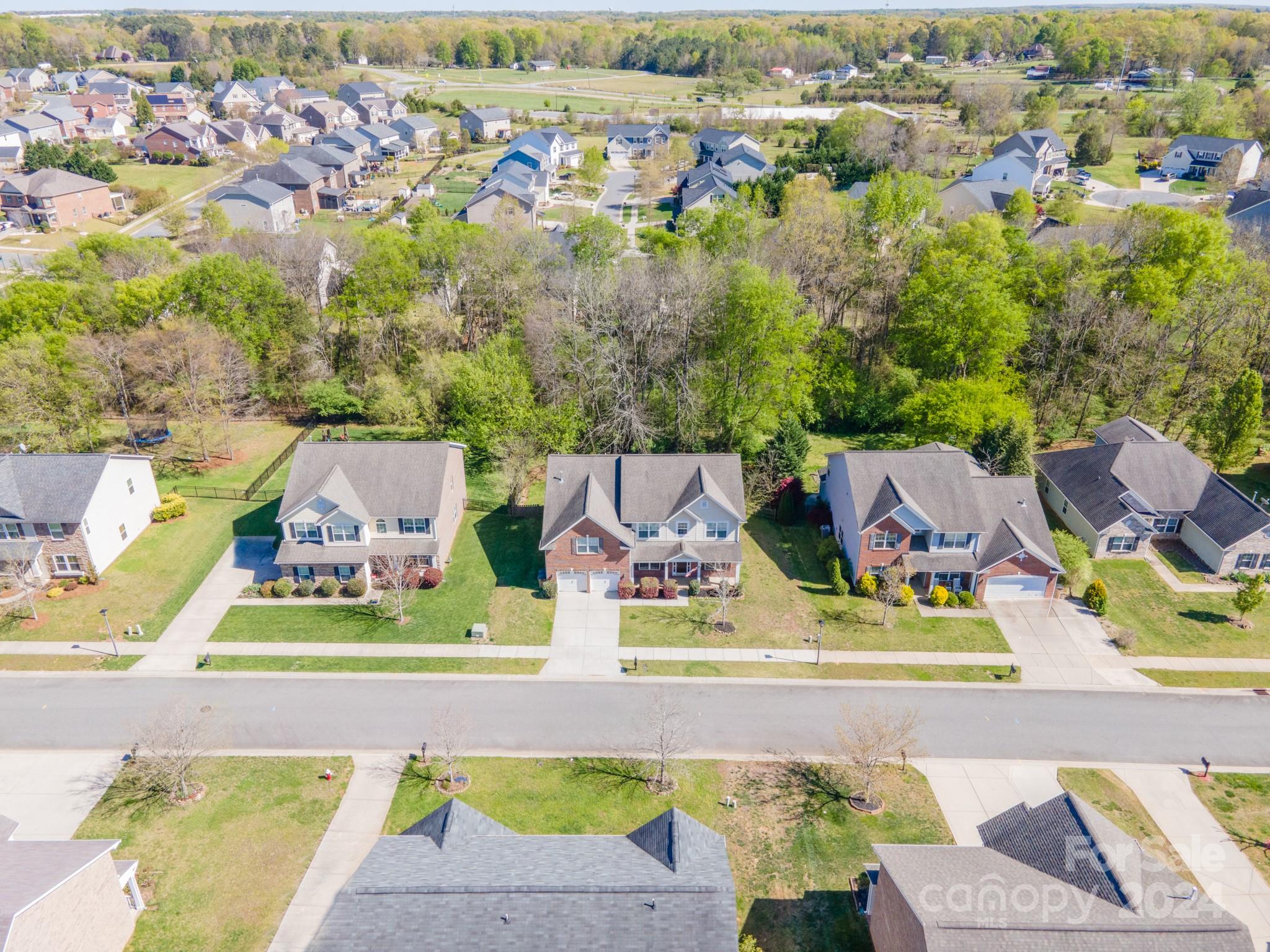 4009 Thorndale Road Indian Trail, NC 28079 - Photo 46 of 48 an aerial view of residential houses with outdoor space